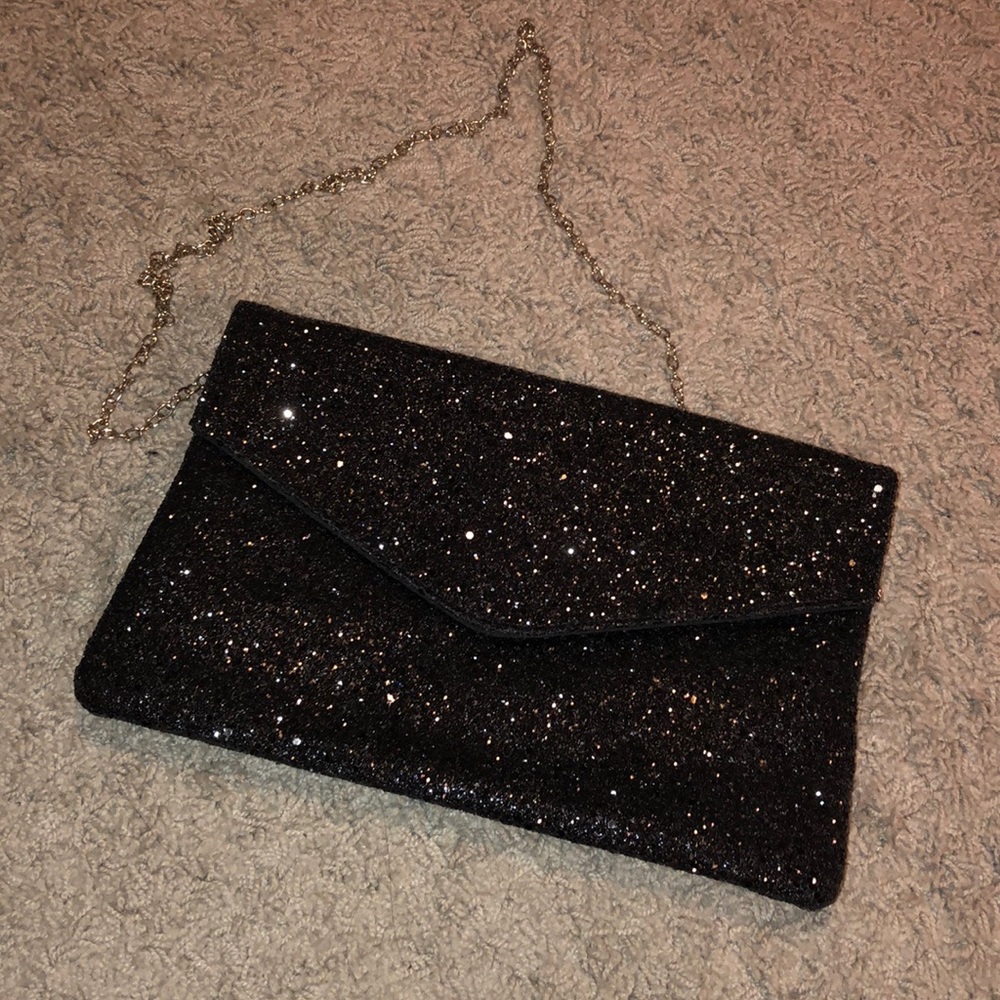 Lulu’s black glitter clutch with chain
